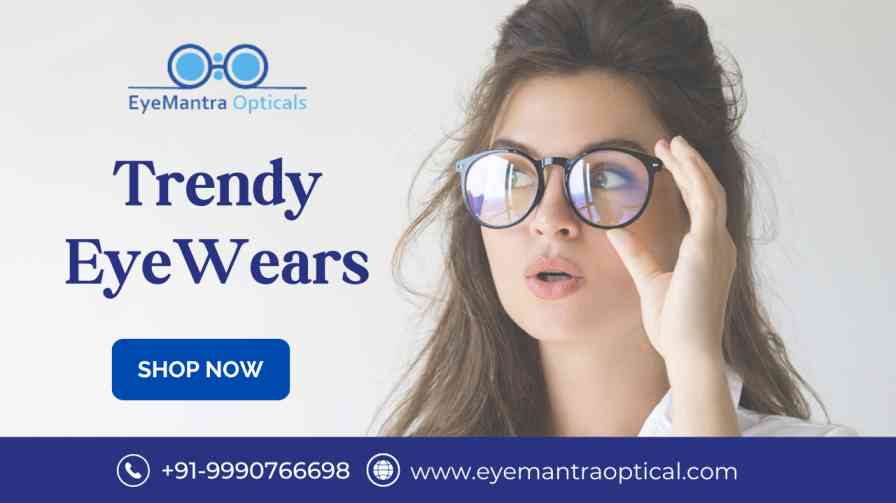 Woman wearing stylish round glasses with the text "Trendy Eyewears – EyeMantra Optical" and contact details