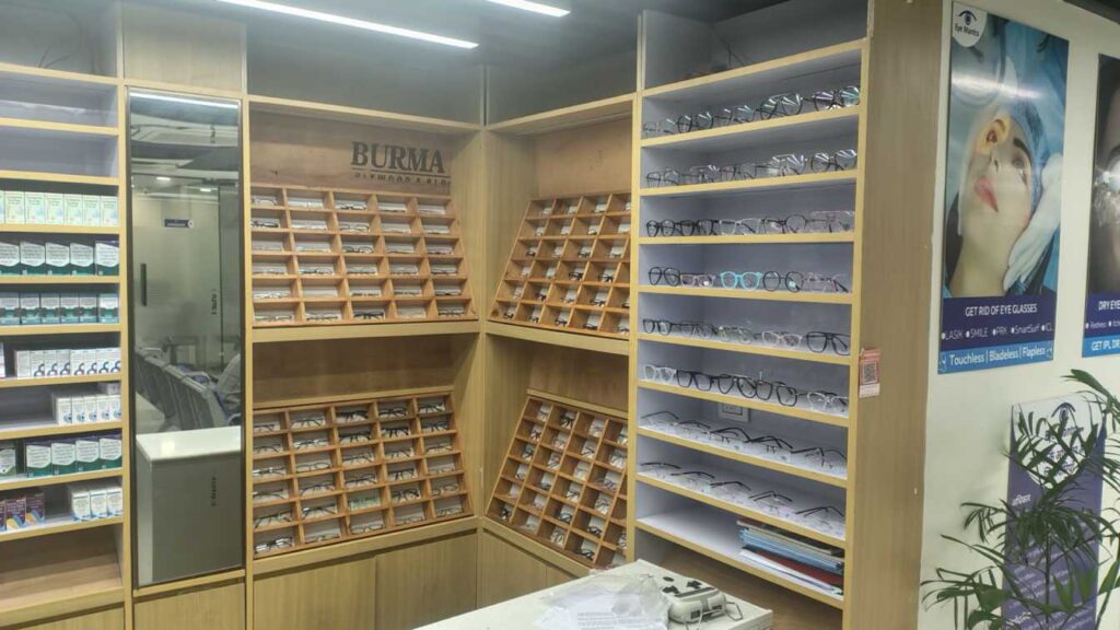 Modern eyewear display shelves with a variety of optical frames and lenses at EyeMantra Optical Gurgaon.