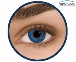 Light blue colored contact lens worn on eye from Freshlook